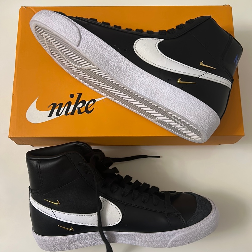 Nike Black White High-Top Sneakers with Gold Swoosh Accents